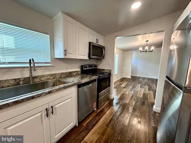 135 Crawford Quarry Rd, Falling Waters, WV 25419 - kitchen with appliances with stainless steel finishes, a sink, dark countertops, white cabinets, and dark wood-style floors