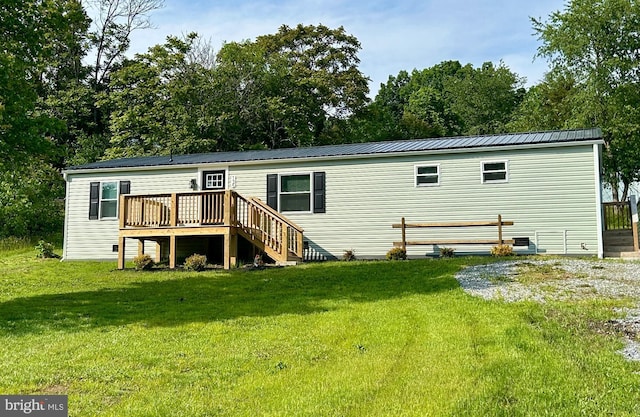 135 Crawford Quarry Rd, Falling Waters, WV 25419 - rear view of house with a wooden deck, a lawn, metal roof, and stairway