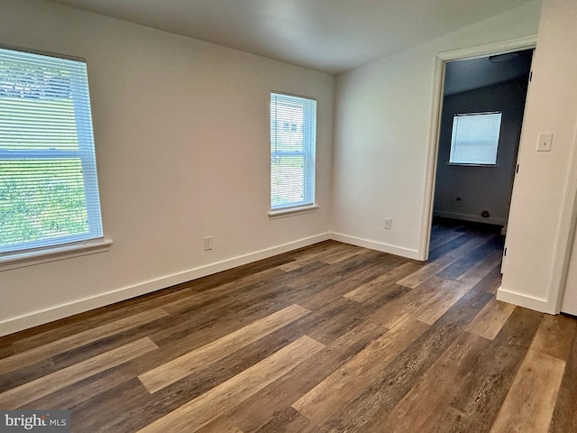 135 Crawford Quarry Rd, Falling Waters, WV 25419 - empty room featuring healthy amount of natural light, dark wood finished floors, and baseboards