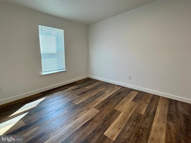 135 Crawford Quarry Rd, Falling Waters, WV 25419 - spare room with baseboards and dark wood finished floors