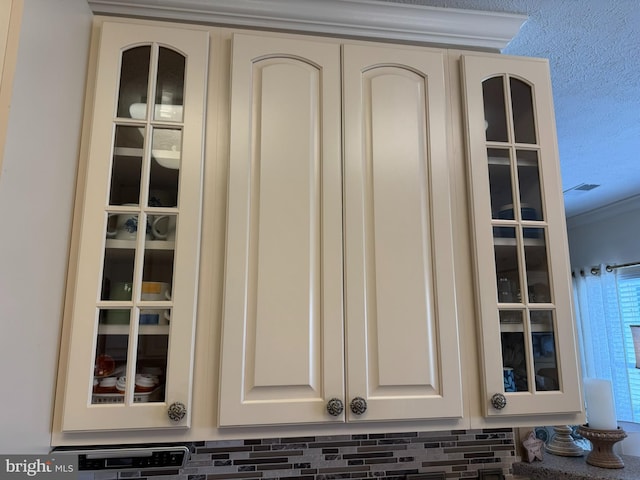 4503-J Dunton Ter, Perry Hall, MD 21128 - kitchen view of glass insert cabinets, white cabinetry, and ornamental molding