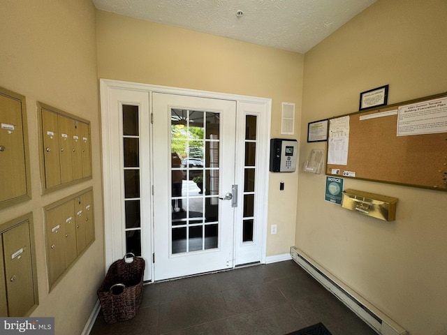 4503-J Dunton Ter, Perry Hall, MD 21128 - property entrance with a baseboard heating unit