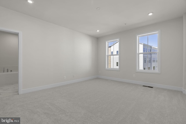 43294 Farringdon Sq, Broadlands, VA 20148 - unfurnished room featuring light carpet, baseboards, and recessed lighting