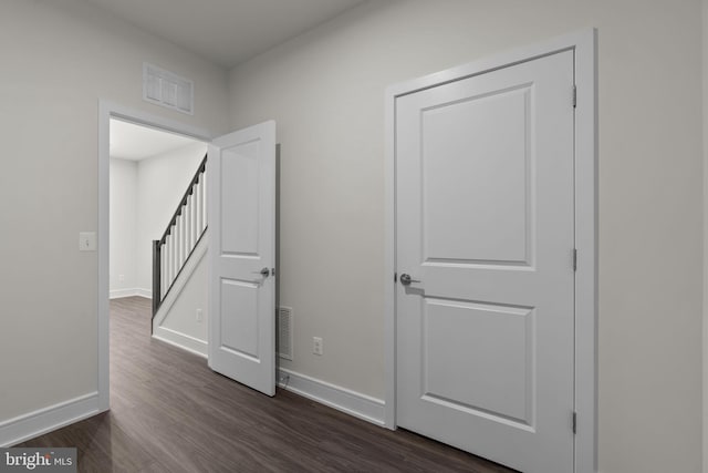 43294 Farringdon Sq, Broadlands, VA 20148 - hall with dark wood finished floors, baseboards, and stairway