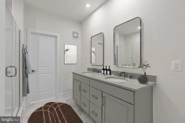 43294 Farringdon Sq, Broadlands, VA 20148 - bathroom with double vanity, marble finish flooring, a shower with shower door, recessed lighting, and baseboards