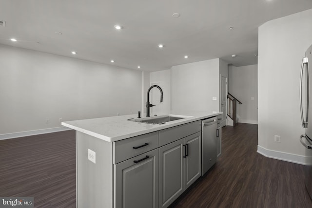 43294 Farringdon Sq, Broadlands, VA 20148 - kitchen with a sink, stainless steel dishwasher, dark wood-type flooring, gray cabinetry, and baseboards