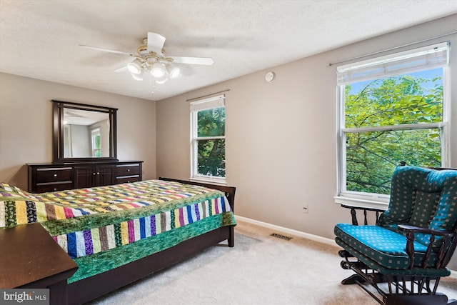 9175 Forest Lawn Ct, Springfield, VA 22152 - carpeted bedroom with multiple windows, baseboards, and ceiling fan