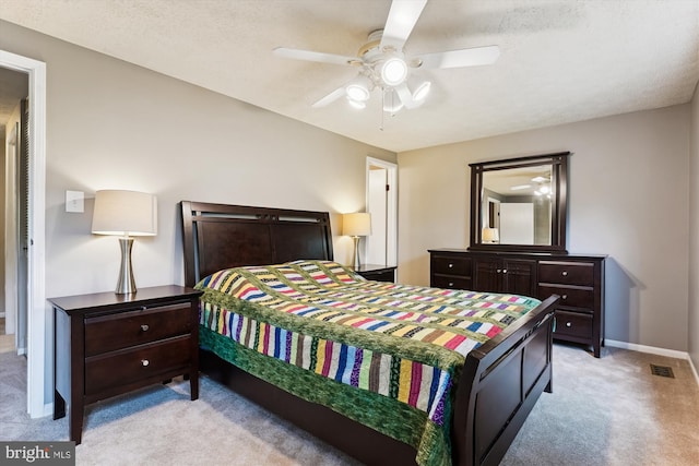 9175 Forest Lawn Ct, Springfield, VA 22152 - bedroom featuring light carpet, baseboards, ceiling fan, and a textured ceiling