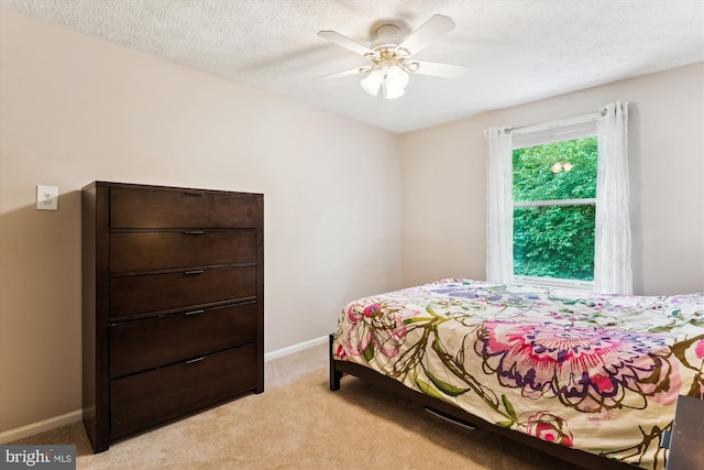 9175 Forest Lawn Ct, Springfield, VA 22152 - bedroom featuring light colored carpet, baseboards, ceiling fan, and a textured ceiling