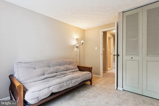 9175 Forest Lawn Ct, Springfield, VA 22152 - sitting room featuring light carpet, a textured ceiling, and baseboards