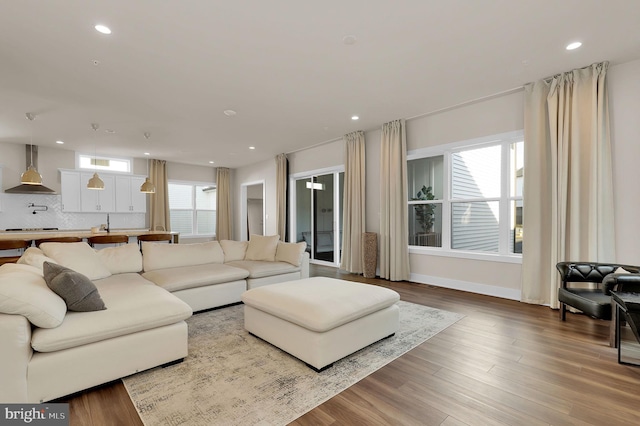 14009 Kip Ter, North Potomac, MD 20878 - living room featuring recessed lighting, wood finished floors, and baseboards