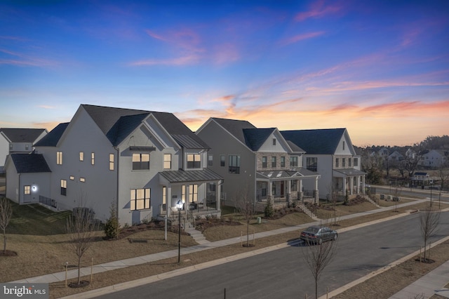 14009 Kip Ter, North Potomac, MD 20878 - view of front of home featuring a standing seam roof, covered porch, metal roof, and a residential view