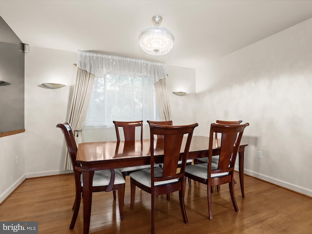 3807 24th Ave, Temple Hills, MD 20748 - dining space featuring baseboards and wood finished floors