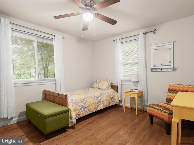 3807 24th Ave, Temple Hills, MD 20748 - bedroom featuring multiple windows, wood finished floors, and a ceiling fan