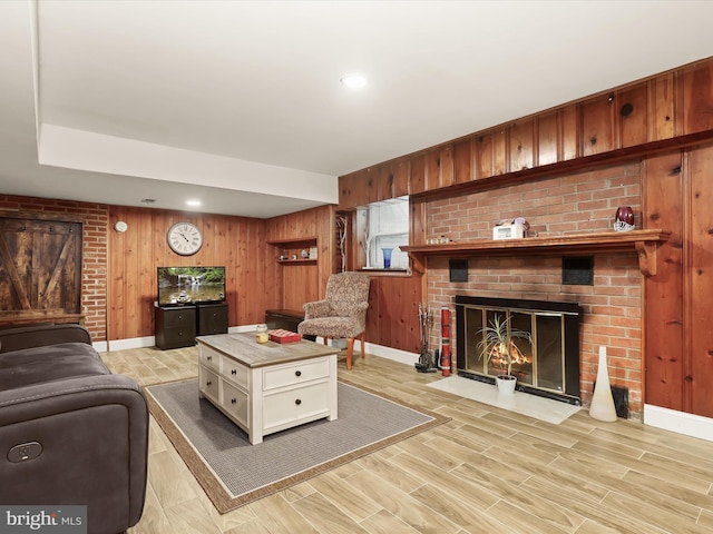 3807 24th Ave, Temple Hills, MD 20748 - living area with wood walls, baseboards, a fireplace, light wood-style flooring, and recessed lighting