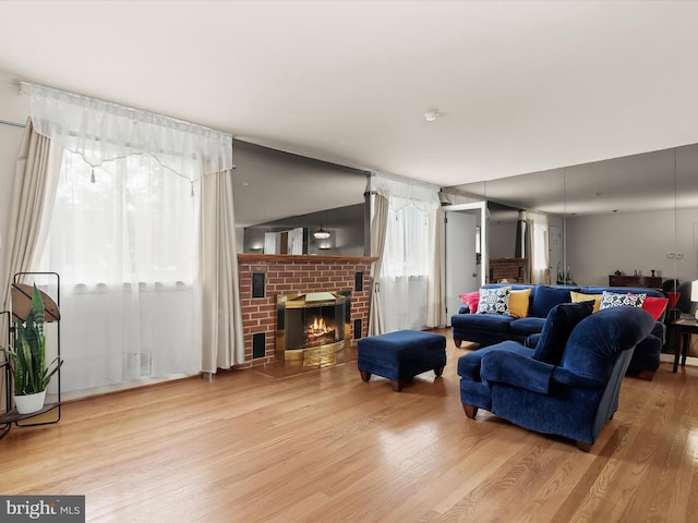 3807 24th Ave, Temple Hills, MD 20748 - living area featuring wood finished floors and a fireplace