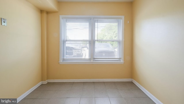 3119 Comly Rd, Philadelphia, PA 19154 - empty room with plenty of natural light, light tile patterned floors, and baseboards