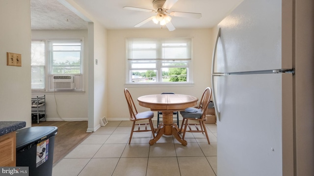 3119 Comly Rd, Philadelphia, PA 19154 - dining room featuring cooling unit, healthy amount of natural light, a ceiling fan, and light tile patterned flooring