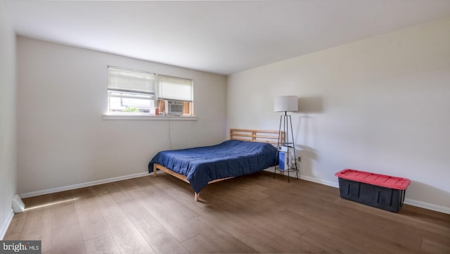 3119 Comly Rd, Philadelphia, PA 19154 - bedroom featuring wood finished floors, baseboards, and cooling unit