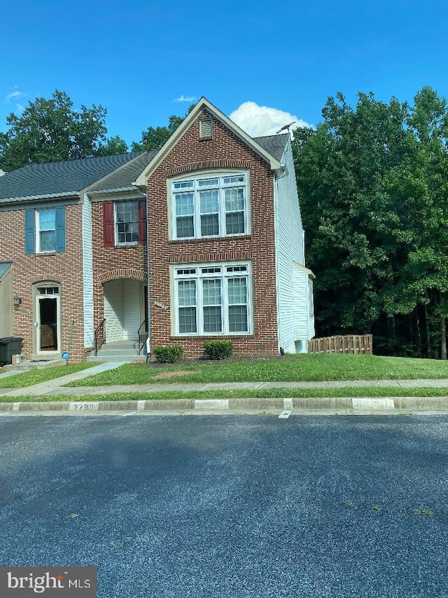 3299 Corcyra Ct, Woodbridge, VA 22192 - view of front of house with uncovered parking and brick siding