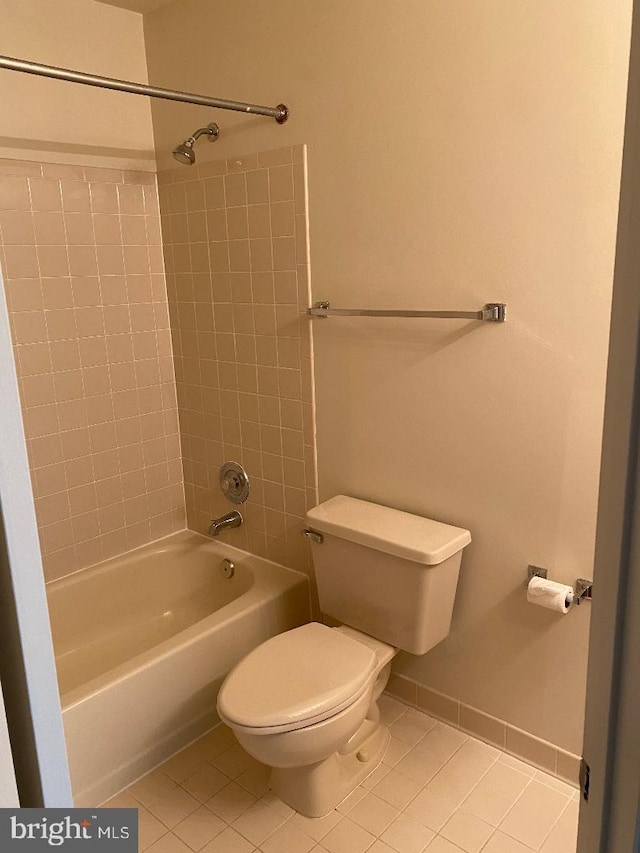 3299 Corcyra Ct, Woodbridge, VA 22192 - full bath featuring tile patterned floors, toilet, shower / tub combination, and baseboards