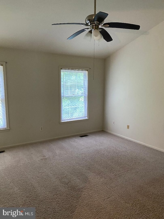 3299 Corcyra Ct, Woodbridge, VA 22192 - empty room featuring healthy amount of natural light, a ceiling fan, carpet flooring, and baseboards
