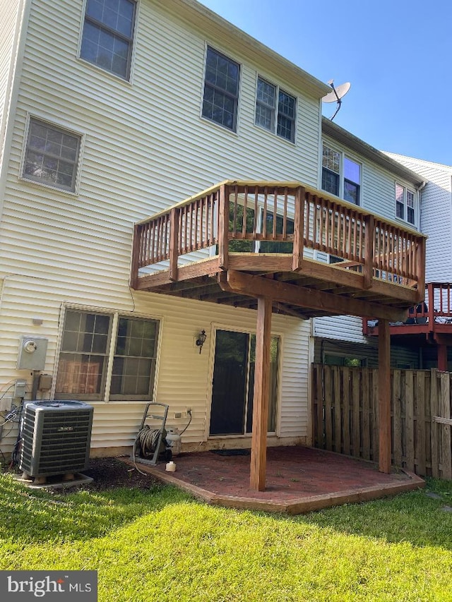 3299 Corcyra Ct, Woodbridge, VA 22192 - rear view of property featuring central air condition unit and a wooden deck