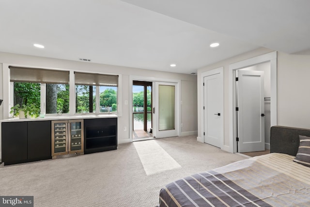 2201 Burgee Ct, Reston, VA 20191 - bedroom with wine cooler, access to exterior, carpet flooring, recessed lighting, and baseboards