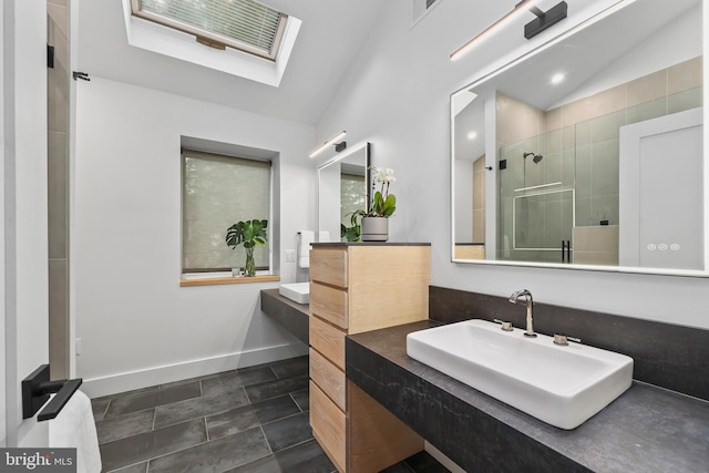 2201 Burgee Ct, Reston, VA 20191 - full bathroom featuring a stall shower, vanity, a skylight, baseboards, and lofted ceiling