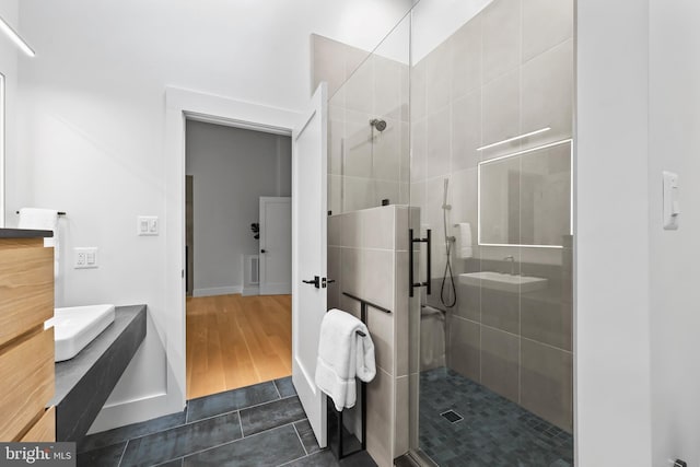 2201 Burgee Ct, Reston, VA 20191 - bathroom featuring a stall shower, vanity, and wood finished floors
