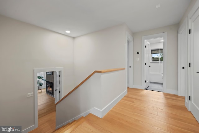 2201 Burgee Ct, Reston, VA 20191 - hall with light wood-type flooring, baseboards, an upstairs landing, and recessed lighting