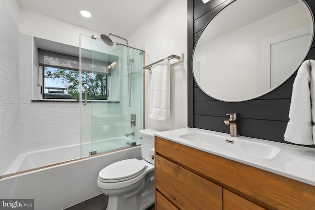 2201 Burgee Ct, Reston, VA 20191 - bathroom featuring toilet, bath / shower combo with glass door, and vanity