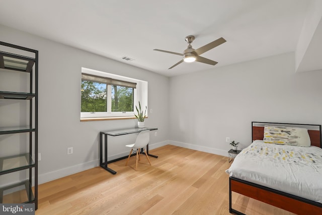 2201 Burgee Ct, Reston, VA 20191 - bedroom with baseboards, wood finished floors, and ceiling fan