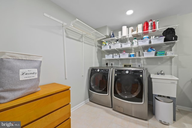 2201 Burgee Ct, Reston, VA 20191 - laundry area with separate washer and dryer, baseboards, and light tile patterned floors