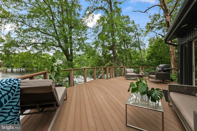 2201 Burgee Ct, Reston, VA 20191 - deck with an outdoor living space, area for grilling, a water view, and view of scattered trees