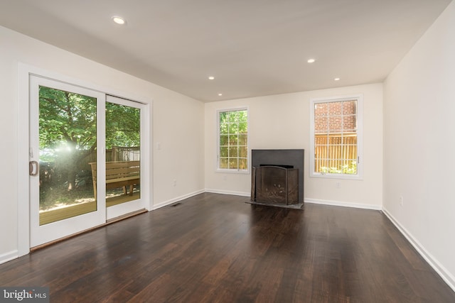 5312 Baltimore Ave, Chevy Chase, MD 20815 - unfurnished living room with dark wood-type flooring, a fireplace with flush hearth, baseboards, and recessed lighting