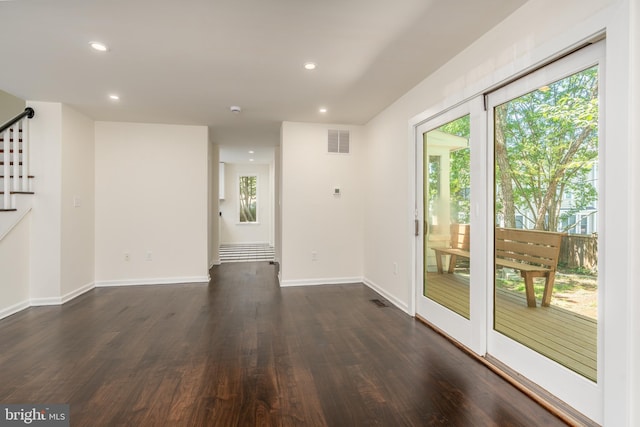 5312 Baltimore Ave, Chevy Chase, MD 20815 - empty room with stairs, recessed lighting, dark wood-style flooring, and baseboards