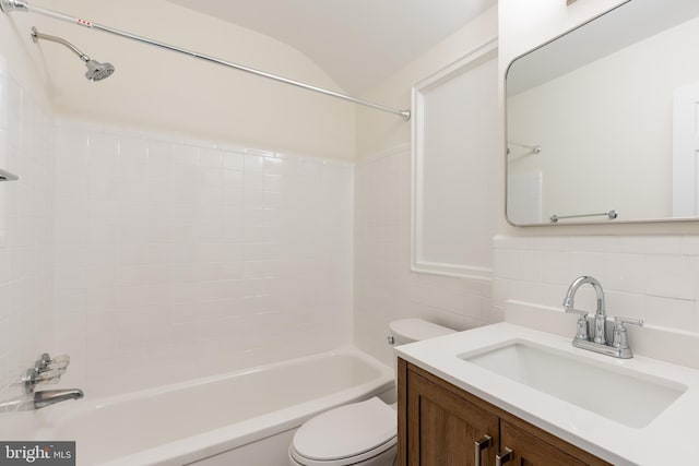 5312 Baltimore Ave, Chevy Chase, MD 20815 - bathroom featuring toilet, shower / bath combination, vanity, tile walls, and tasteful backsplash