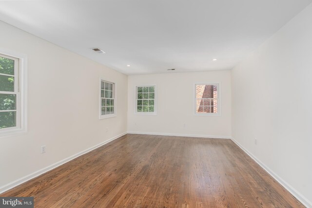 5312 Baltimore Ave, Chevy Chase, MD 20815 - spare room with wood finished floors, baseboards, and recessed lighting