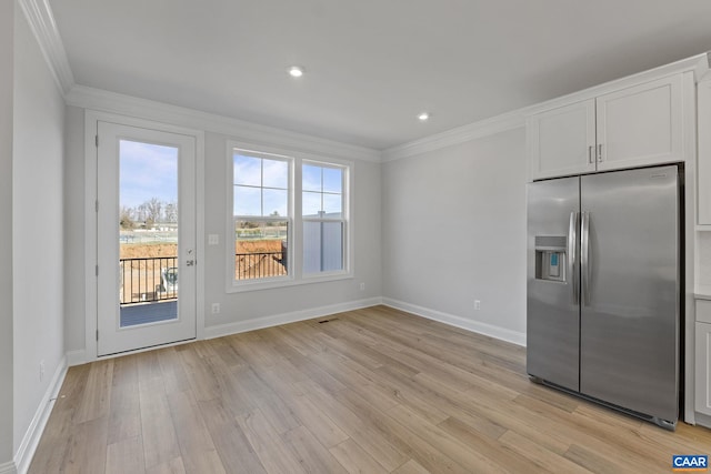 770 Park Ridge Dr, Crozet, VA 22932 - kitchen featuring stainless steel refrigerator with ice dispenser, crown molding, baseboards, light wood-style flooring, and white cabinets
