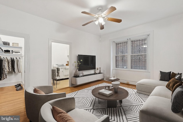 1514 17th St NW Unit 114, Washington, DC 20036 - living area featuring wood finished floors and ceiling fan