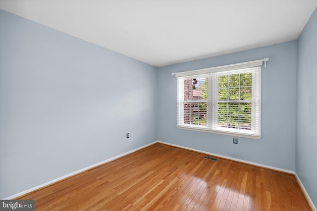 2893 Sutton Oaks Ln, Vienna, VA 22181 - unfurnished room with baseboards and wood-type flooring