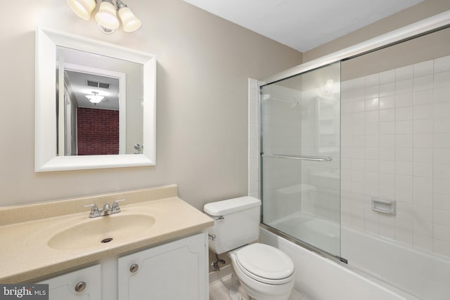 2893 Sutton Oaks Ln, Vienna, VA 22181 - bathroom featuring vanity, toilet, and combined bath / shower with glass door