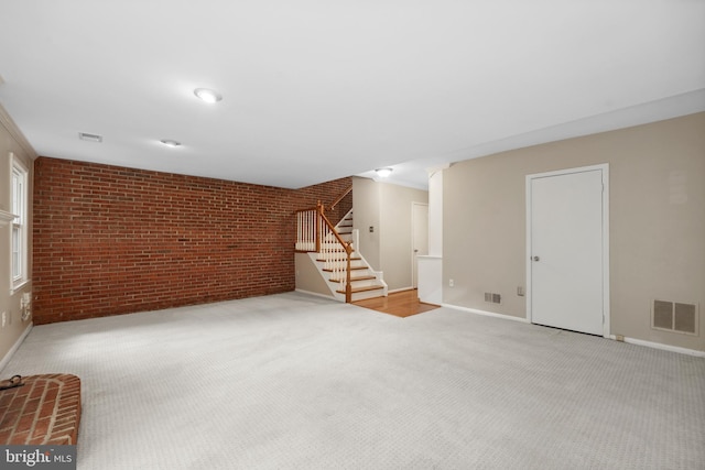2893 Sutton Oaks Ln, Vienna, VA 22181 - below grade area featuring brick wall, stairway, carpet floors, and baseboards