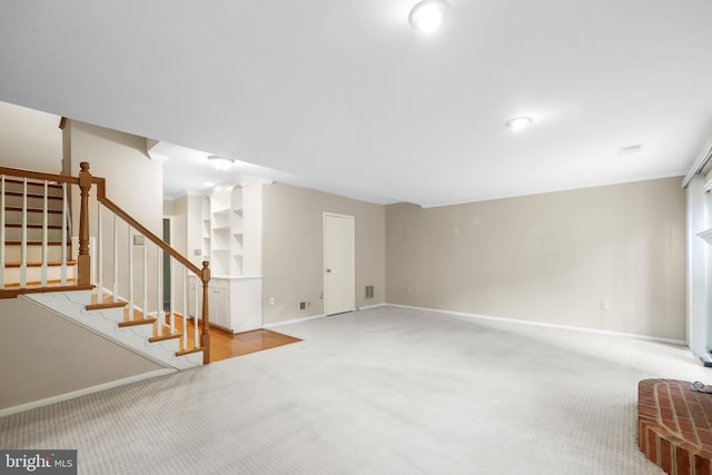 2893 Sutton Oaks Ln, Vienna, VA 22181 - unfurnished living room featuring carpet floors, stairway, and baseboards