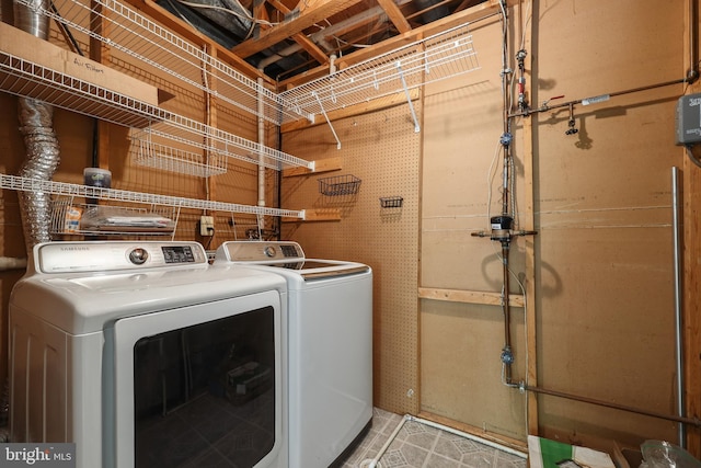 2893 Sutton Oaks Ln, Vienna, VA 22181 - washroom with washer and dryer and tile patterned floors