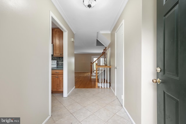 2893 Sutton Oaks Ln, Vienna, VA 22181 - entryway featuring light tile patterned floors, ornamental molding, and baseboards