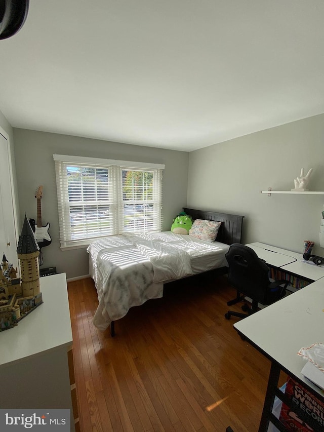 2893 Sutton Oaks Ln, Vienna, VA 22181 - bedroom with wood finished floors and a desk