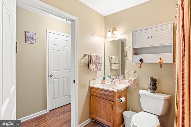 4 Hagarman Dr Unit 4, York, PA 17408 - full bath featuring vanity, toilet, wood finished floors, and baseboards