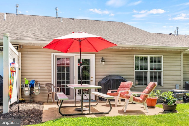 4 Hagarman Dr Unit 4, York, PA 17408 - rear view of house with roof with shingles, a patio area, and central AC
